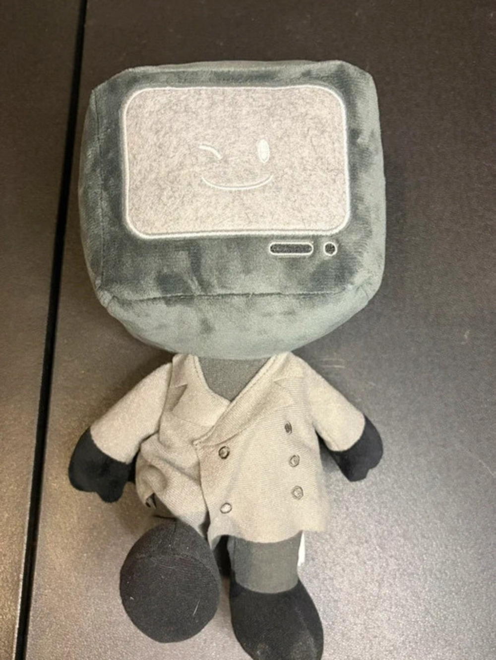 Skibidi Toilet Plush Doll with Winking TV Head and Gray Coat